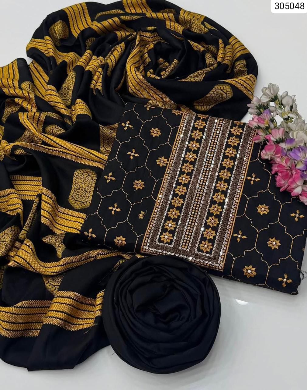 Experience true royalty with our latest unstitched 3-piece masterpiece