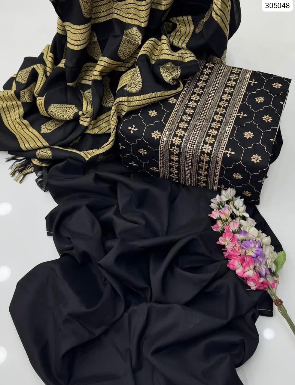 Experience true royalty with our latest unstitched 3-piece masterpiece